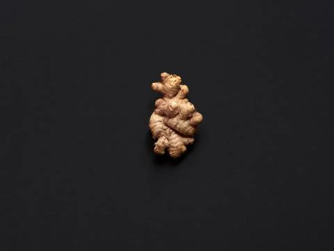 Isolated ginger root over a black background Stock Photos