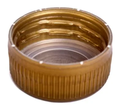Isolated gold plastic cap Stock Photos
