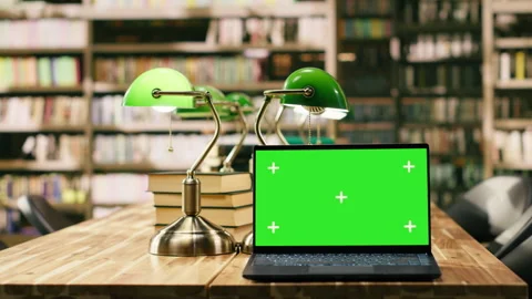 Isolated green screen mockup on laptop inside empty library Stock Footage 336359566