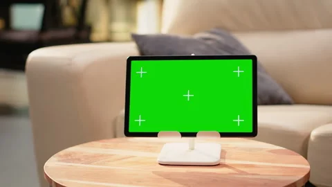 Isolated green screen on tablet in empty modern living room Stock Footage 344245503