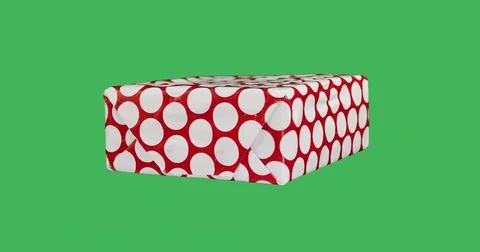 Isolated hand made gift box on green background. Stock Footage 82702408