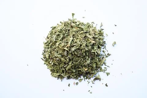 Isolated heap of dried mint tea leaves Stock Photos