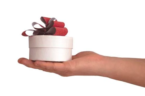 Isolated image. Gift box in the palm of your hand. Stock Photos