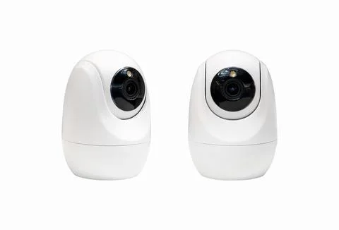 Isolated indoors smart security camera. Surveillance cameras. Stock Photos