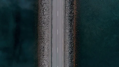 Isolated infinity bridge or road on water surface Stock Footage 104832357