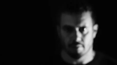 Isolated man on black background makes gesture to stop someone or something Stock Footage 41771286