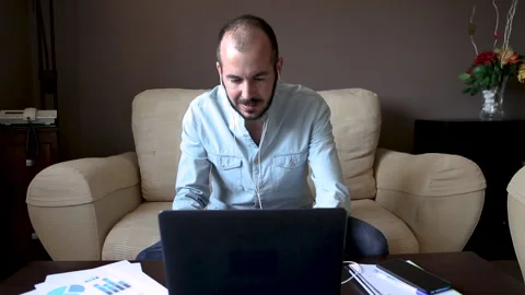 Isolated man working from home. Teleworking concept Stock Footage 130879795