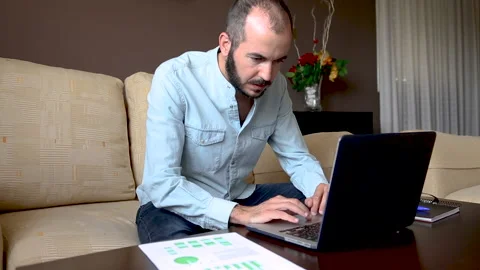Isolated man working from home. Teleworking concept Stock Footage 130879897