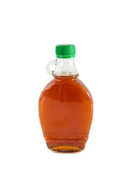 Isolated maple syrup in a bottle Stock Photos