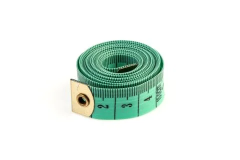 Isolated measuring tape on a white background Stock Photos