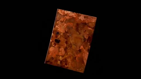 Isolated metal plate with abstract texture rotating on a black background Stock Footage 152112853