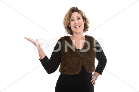 Isolated middle aged business woman presenting with her hand over white. Stock Photos