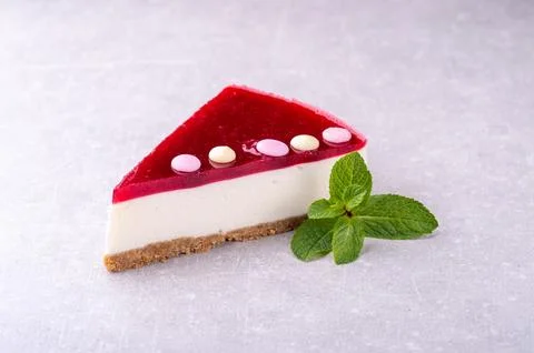Isolated mini raspberry mousse cake on the white background. Stock Photos