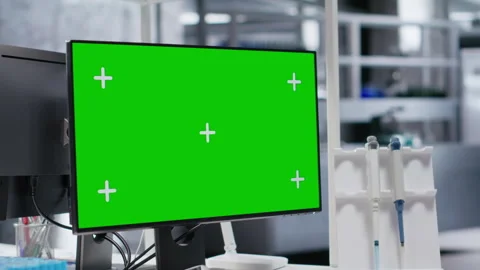 Isolated mockup computer on a desk in empty laboratory space 스톡 동영상 317784016