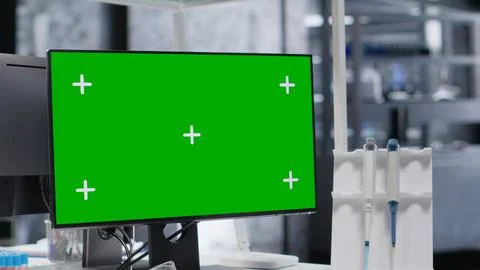 Isolated mockup computer on a desk in empty laboratory space Stock Photos