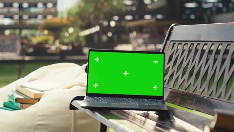Isolated mockup screen on laptop placed on campus bench Stock Footage 340793002