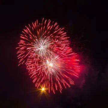 Isolated multiple red fireworks burst Fotos de archivo