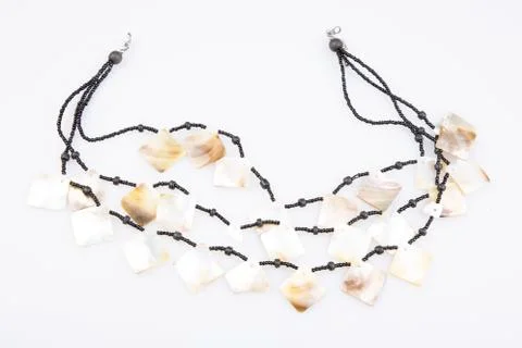 Isolated necklace made of shells on white background 写真素材