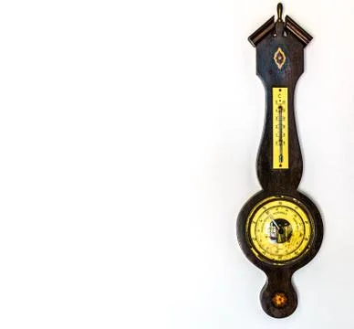 Isolated old barometer on white wall Stock Photos
