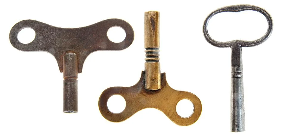 Isolated old wind-up clock keys Stock Photos