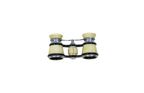 Isolated opera glasses on a white background. Old vintage ivory pair of opera Stock Photos