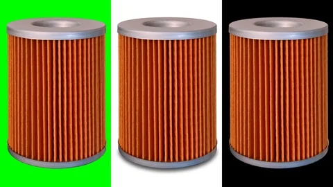 Isolated orange insert engine oil filter (loop) Stockbeeldmateriaal 116489670