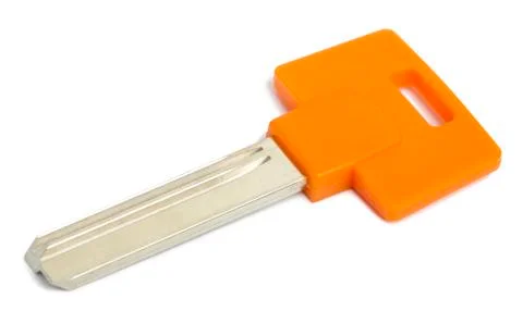 Isolated orange key Stock Photos