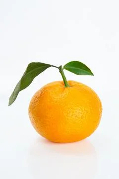 Isolated Orange With Leaf on White Background Foto stock