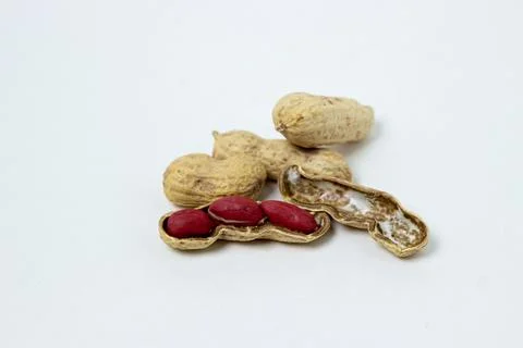 Isolated peanuts on a white background. Peanuts in shells. Stock Photos
