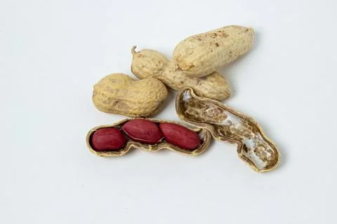 Isolated peanuts on a white background. Peanuts in shells. Stock Photos