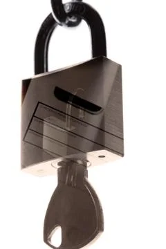 An isolated photo of a padlock with a container reflection on it - perfect fo Stock Photos