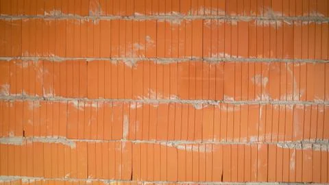Isolated pile of builders bricks. Ceramic blocks stack Stock Photos