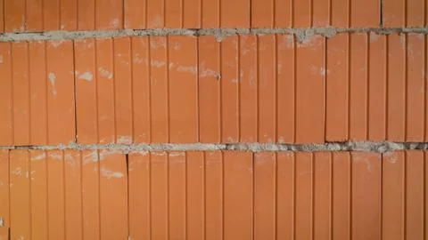 Isolated pile of builders bricks. Ceramic blocks stack Foto stock
