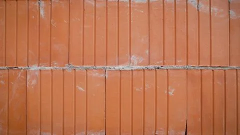 Isolated pile of builders bricks. Ceramic blocks stack Stock Photos