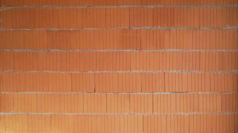 Isolated pile of builders bricks. Ceramic blocks stack Foto stock
