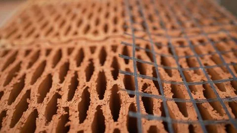 Isolated pile of builders bricks. Ceramic blocks stack Foto stock