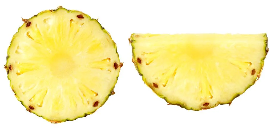 Isolated pineapple fruit slices. Two pineapple pieces isolated on white Stock Photos