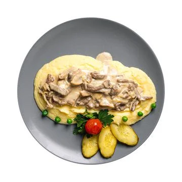 Isolated portion of beef stroganoff with potato Stock Photos