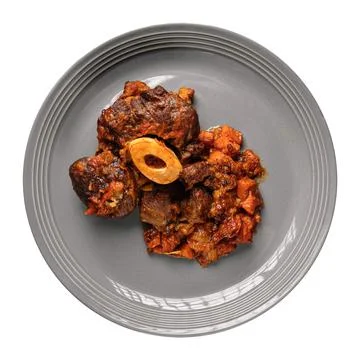 Isolated portion of cooked ossobuco dish Stock Photos