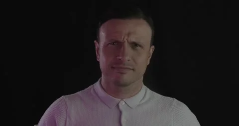 Isolated portrait of aggressive handsome guy is screaming. Angry white man's  Stock Footage 136373712