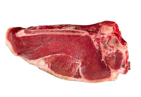 Isolated raw beef entrecote bone on the white Foto stock