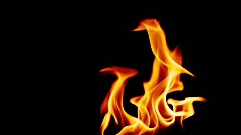 Isolated real fire flame igniting and burning on black background in slow motion Stock Footage 140723161
