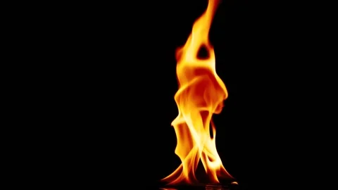 Isolated real fire flame igniting and burning on black background in slow motion Stock Footage 141703869