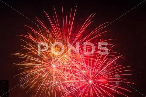 Isolated red fireworks burst Stock Photos