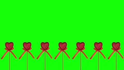 Isolated red hearts dancing on green screen chroma key background Stock Footage 262241821