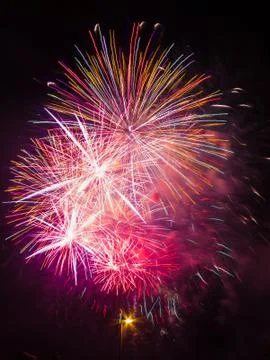 Isolated red multi colored fireworks burst Stock Photos