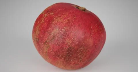 Isolated red pomegranate on a white background. Stock Photos