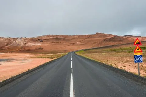 Isolated road and mountain landscape at Iceland Stock Photos