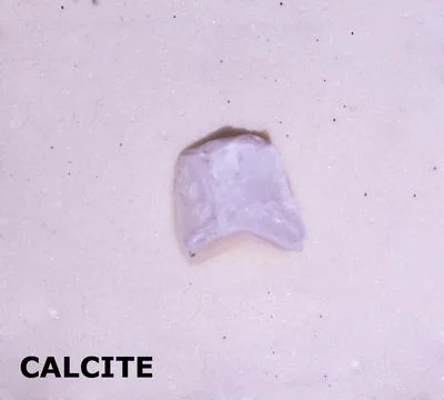 Isolated sample of a Calcite rock on texture background. Calcite Metamorphi.. Stock Photos