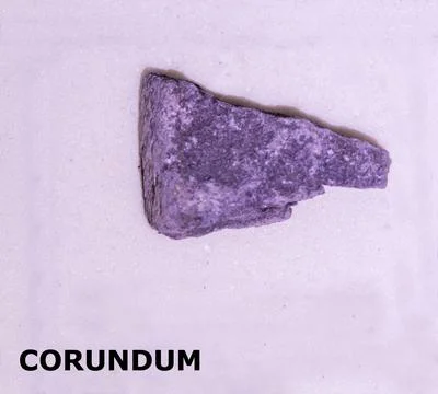 Isolated sample of a Corundum rock on texture background. Corundum Sediment.. Stock Photos